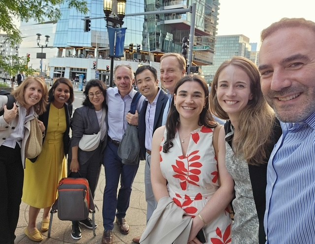 casual candid image of 4 o 6 team outside after a workday